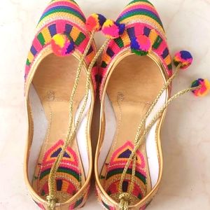Colourful juttis with ankle tie up